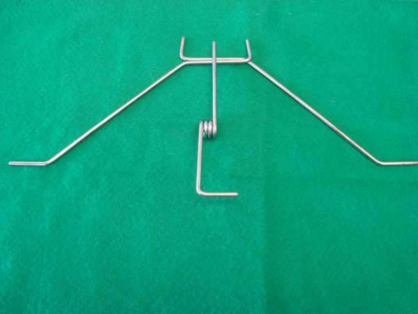 TREM DE POUSO BEQUILHA 60mm C/ MOLA 4 voltas e CENTRAL C/ ARAME DE 4mm CONJUNTO